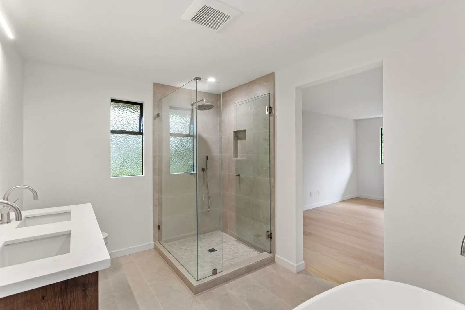 Finished primary bathroom in Bellevue, WA, wide view