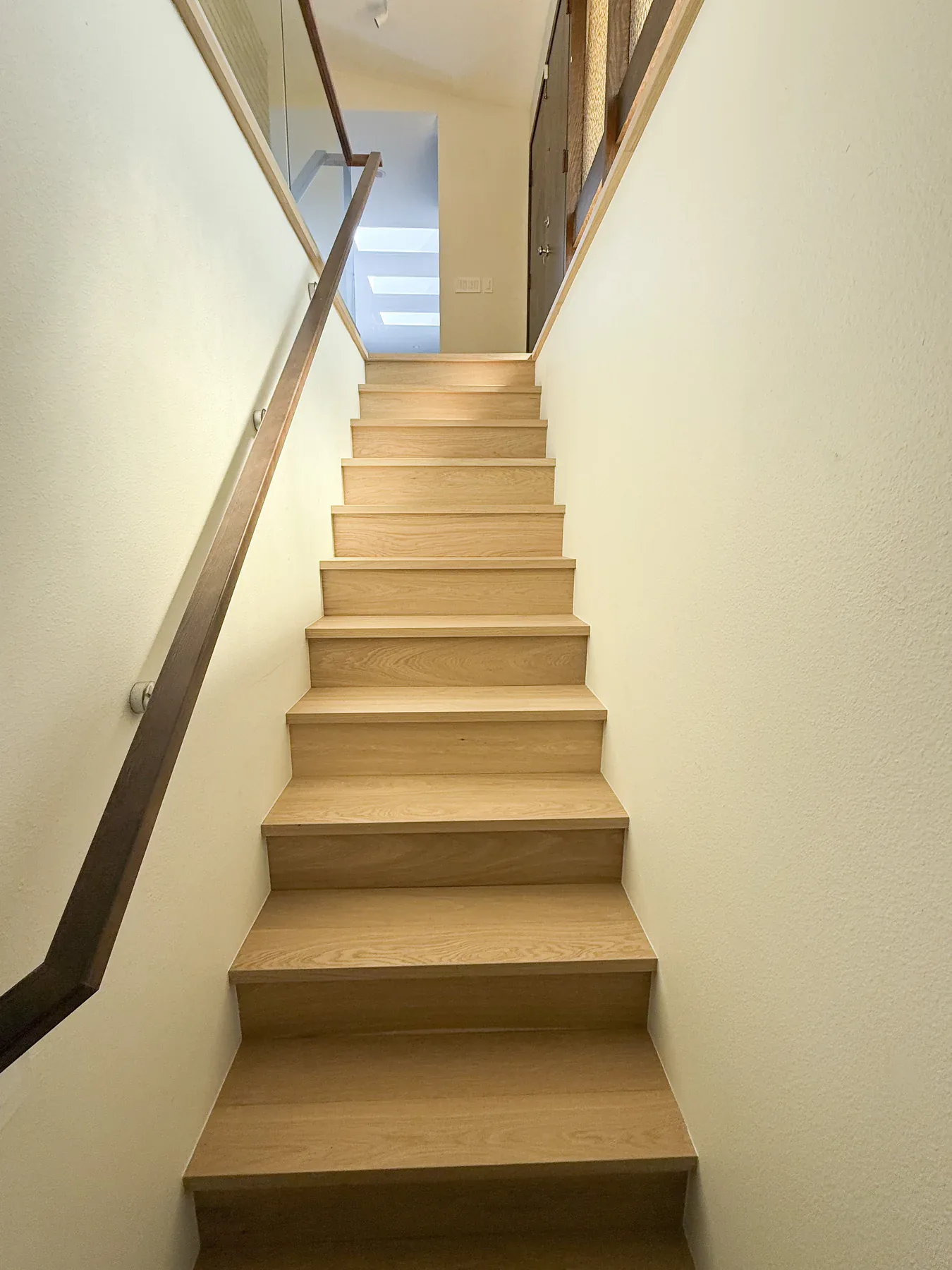 Completed Bellevue wood staircase and handrail