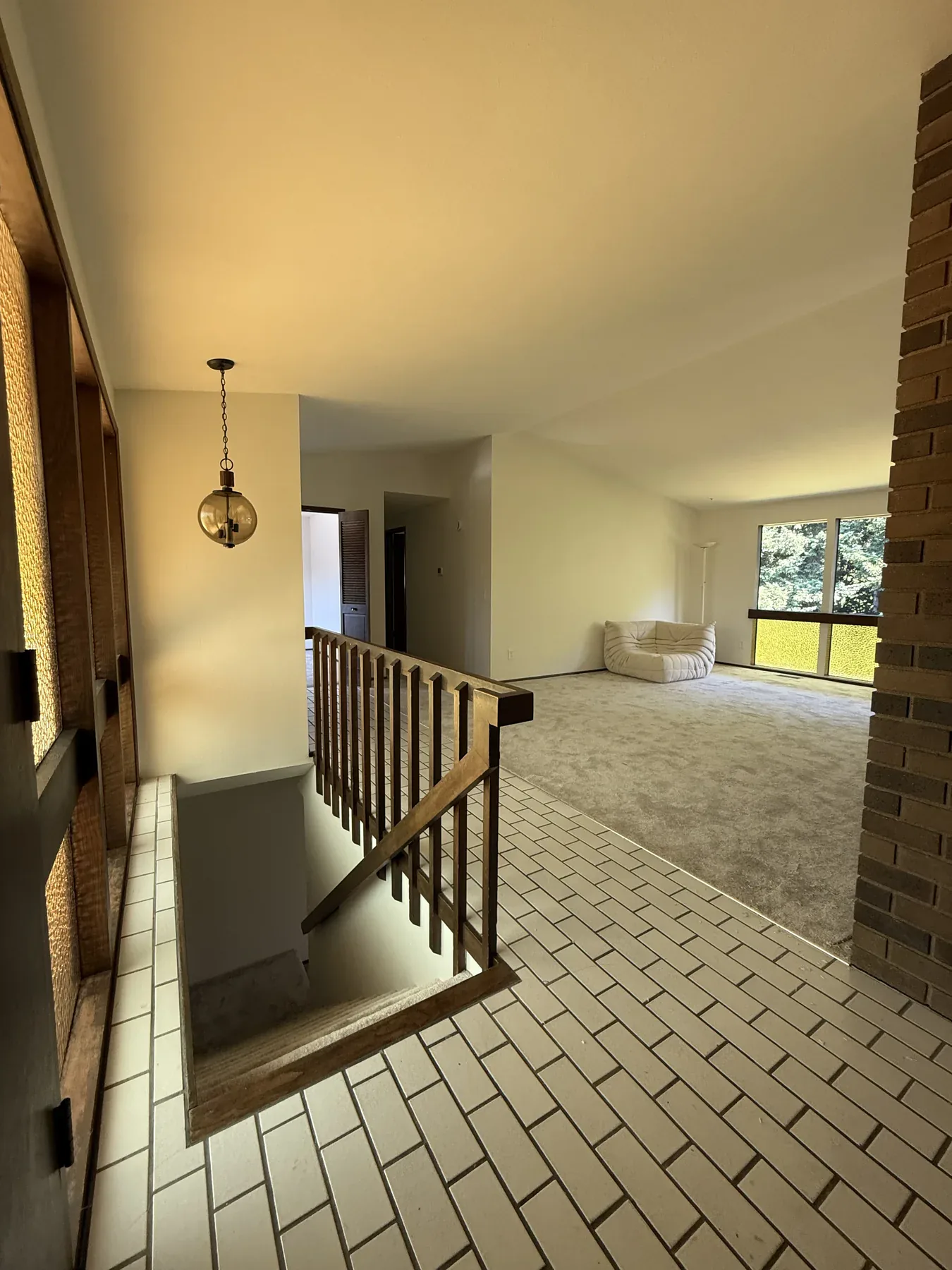 Old Bellevue entry and kitchen view before remodeling