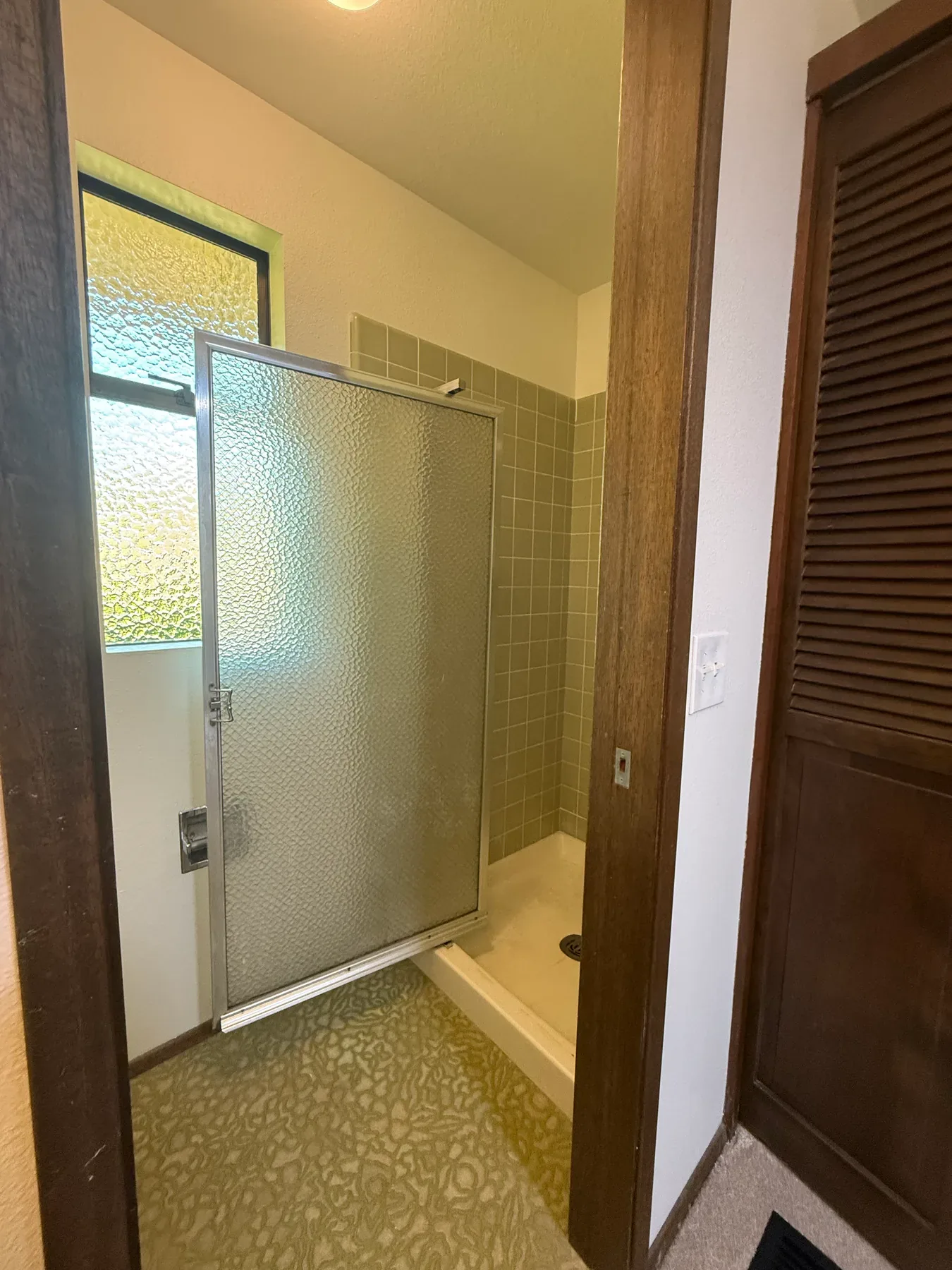 Existing primary bathroom in Bellevue, WA, view 2