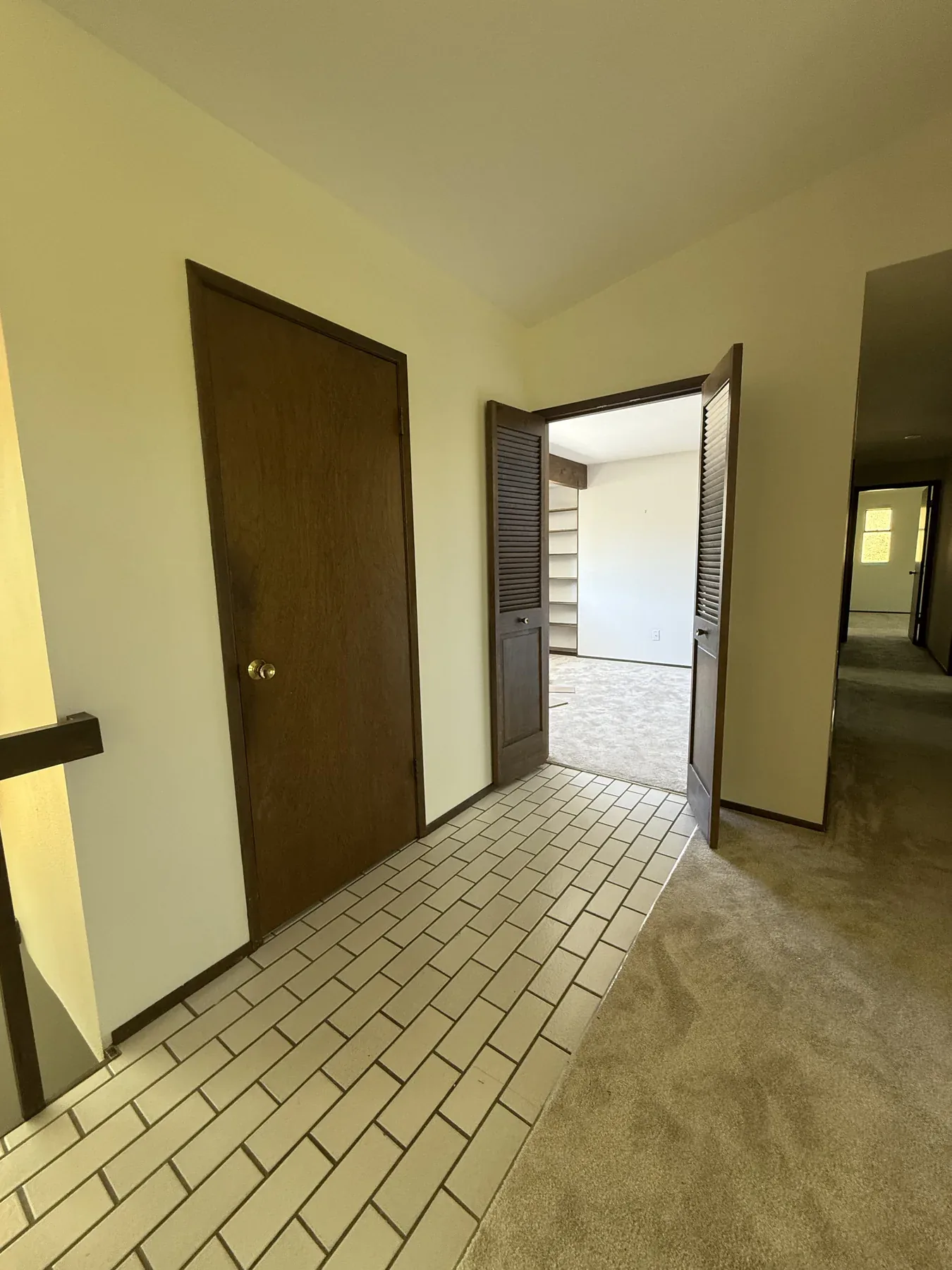 Old Bellevue lower-level hall before remodeling