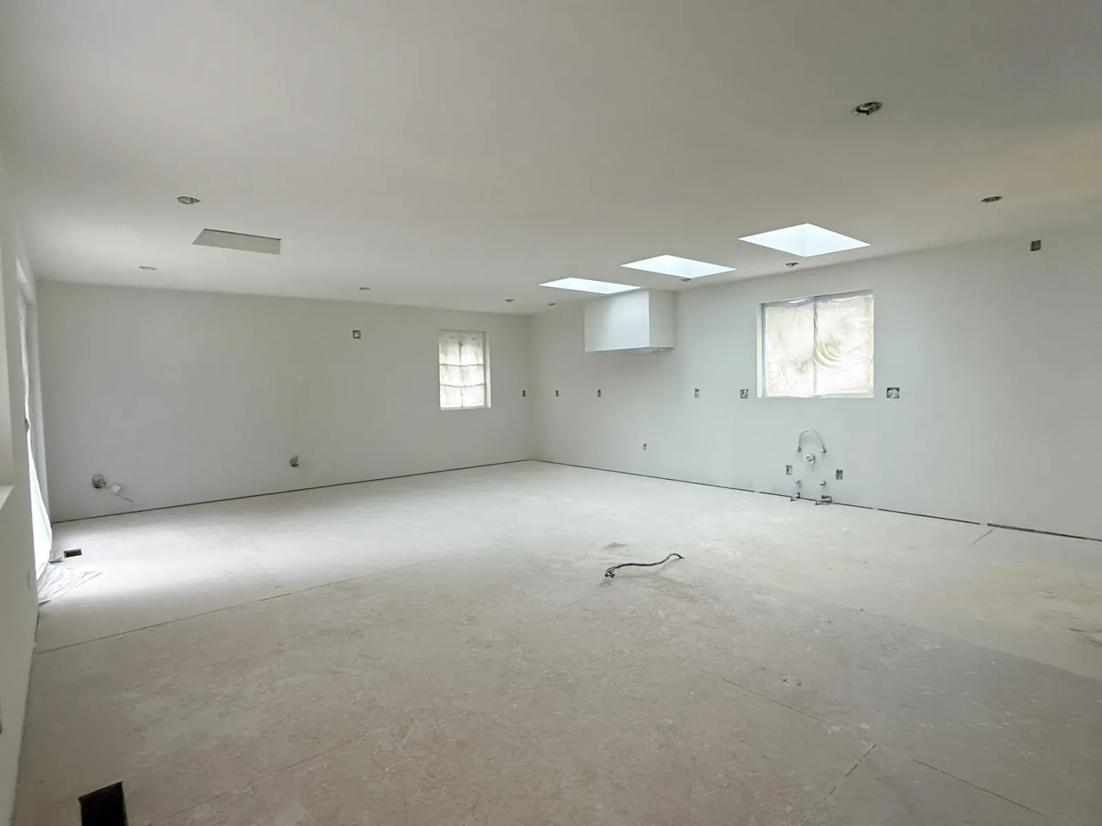 Bellevue kitchen after framing, rough-ins, insulation, and drywall