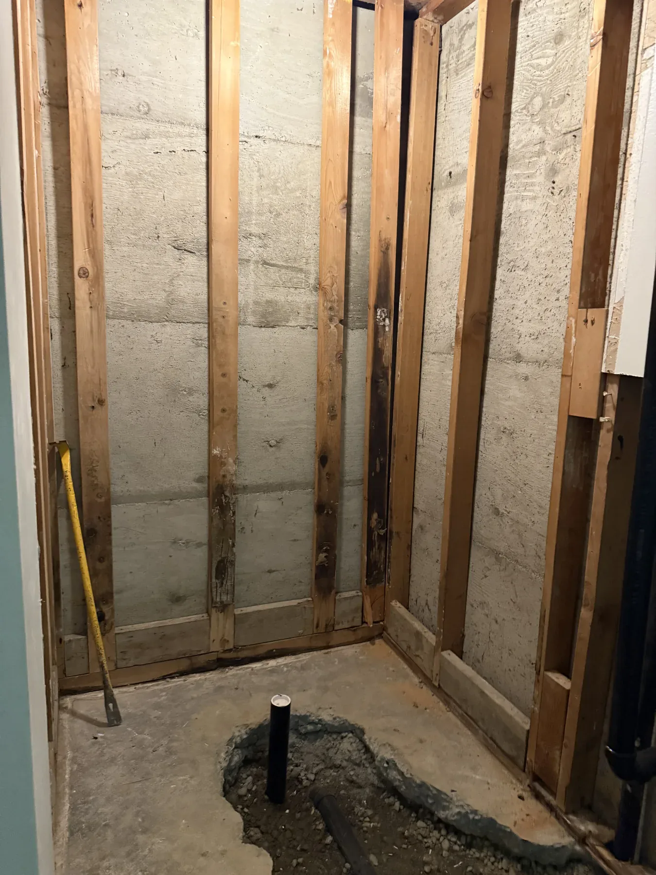 Lower-floor bathroom demolition and new framing during the Bellevue remodel