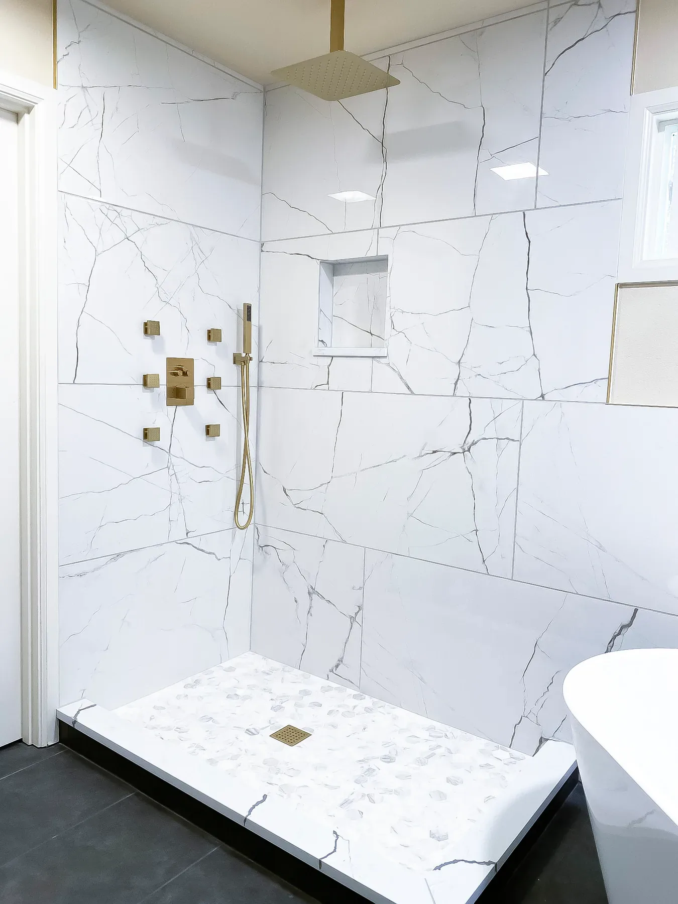 Marble-Look Primary Bathroom in Issaquah, WA