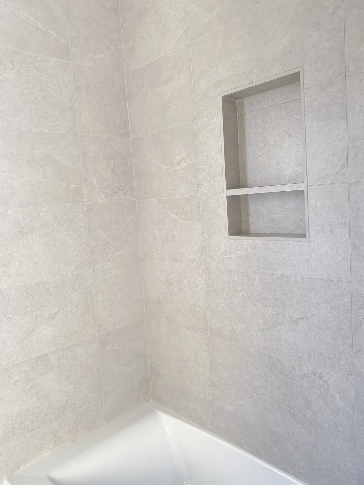 Built-in bathroom niche in the Kirkland whole home remodel