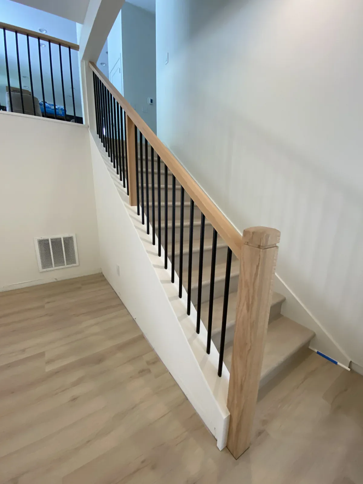 Custom stair rail after the Kirkland whole home remodel