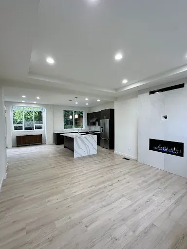 Finished kitchen and fireplace connection in the Kirkland whole home remodel