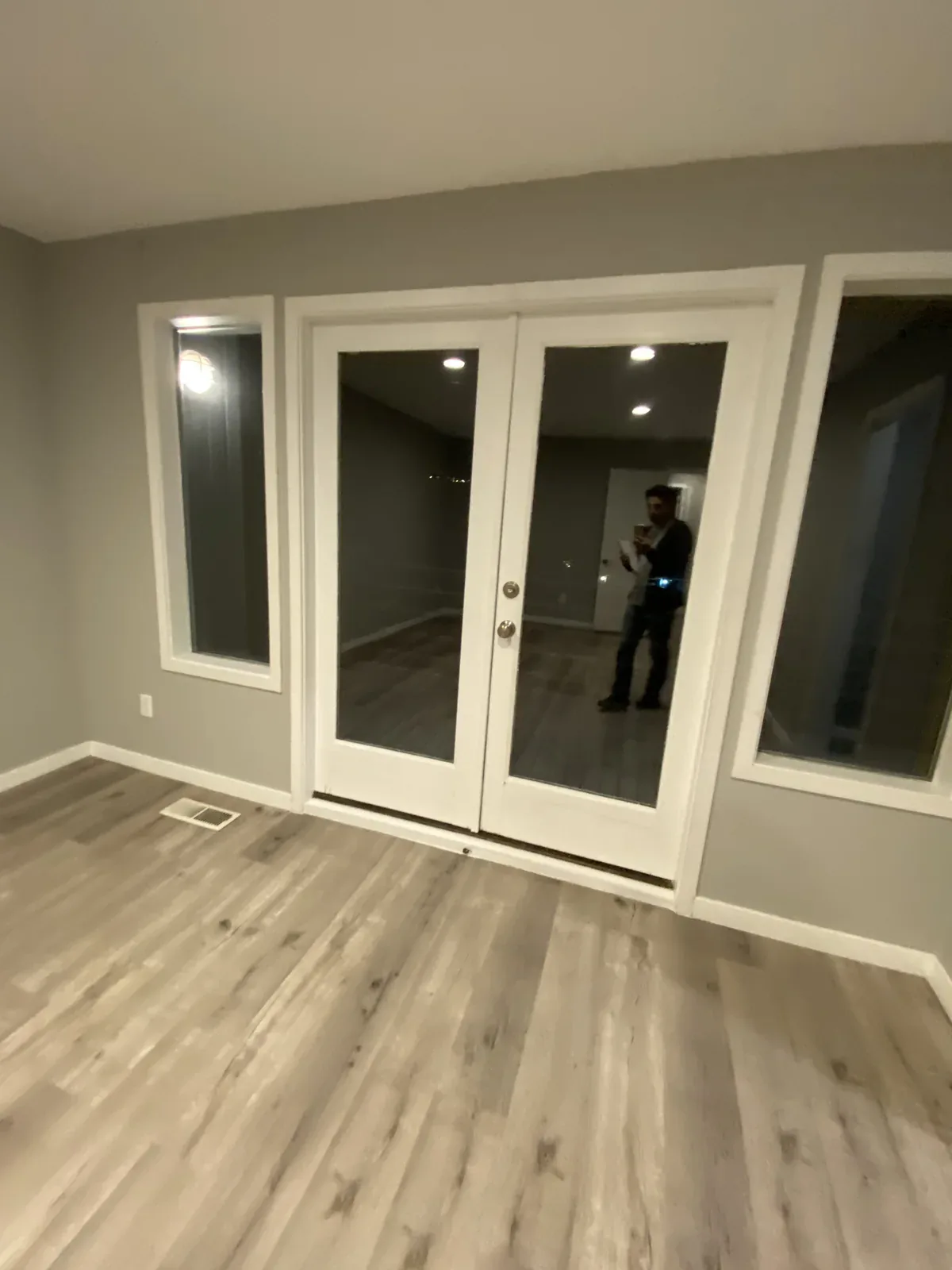 Lower-level exterior doors before the Kirkland whole home remodel