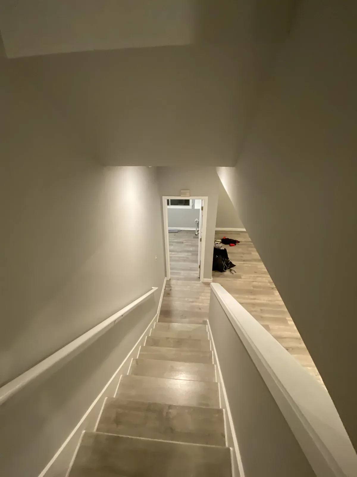 Lower-level stair hall before the Kirkland whole home remodel