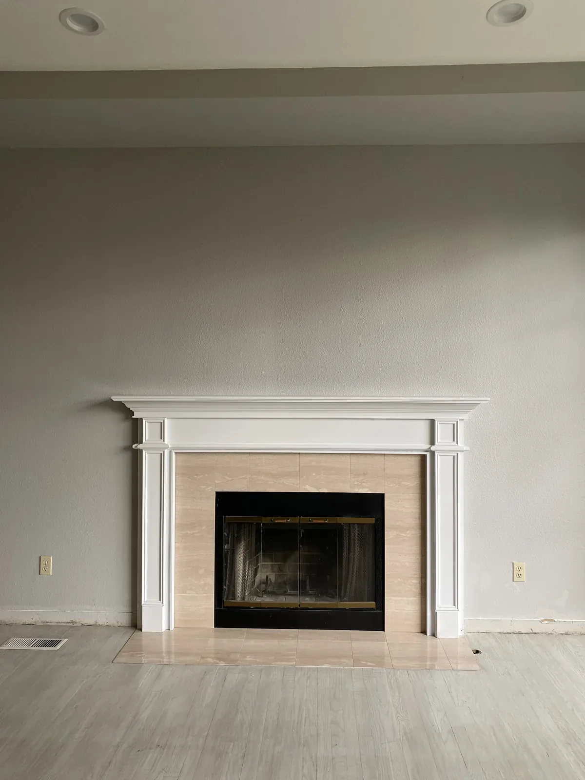 Old living-room fireplace before the Kirkland whole home remodel