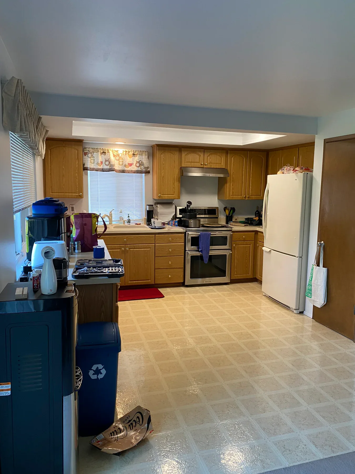 Old Kirkland kitchen cooking wall with oak cabinets