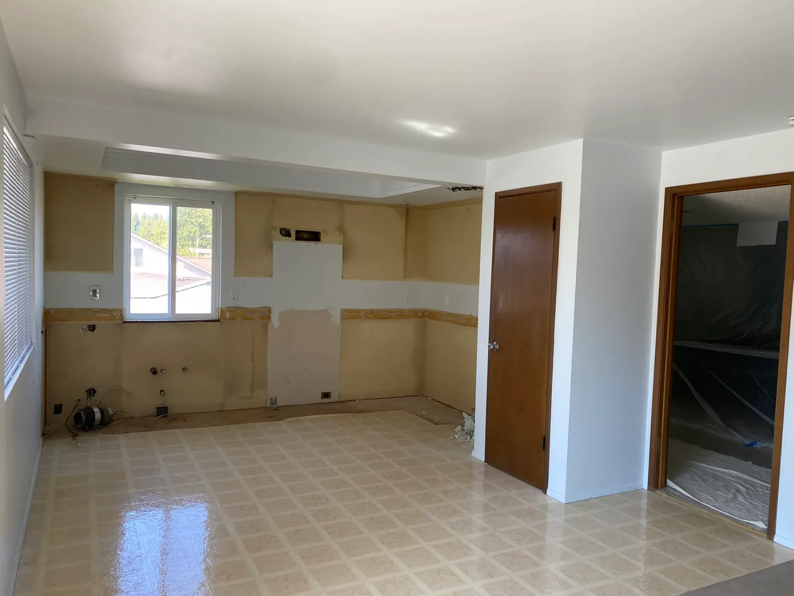 Kirkland kitchen after the initial demolition and appliance removal