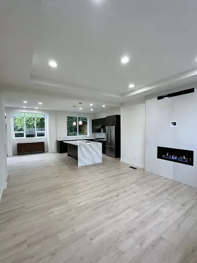 Finished kitchen and living area in Kirkland, WA, view 1