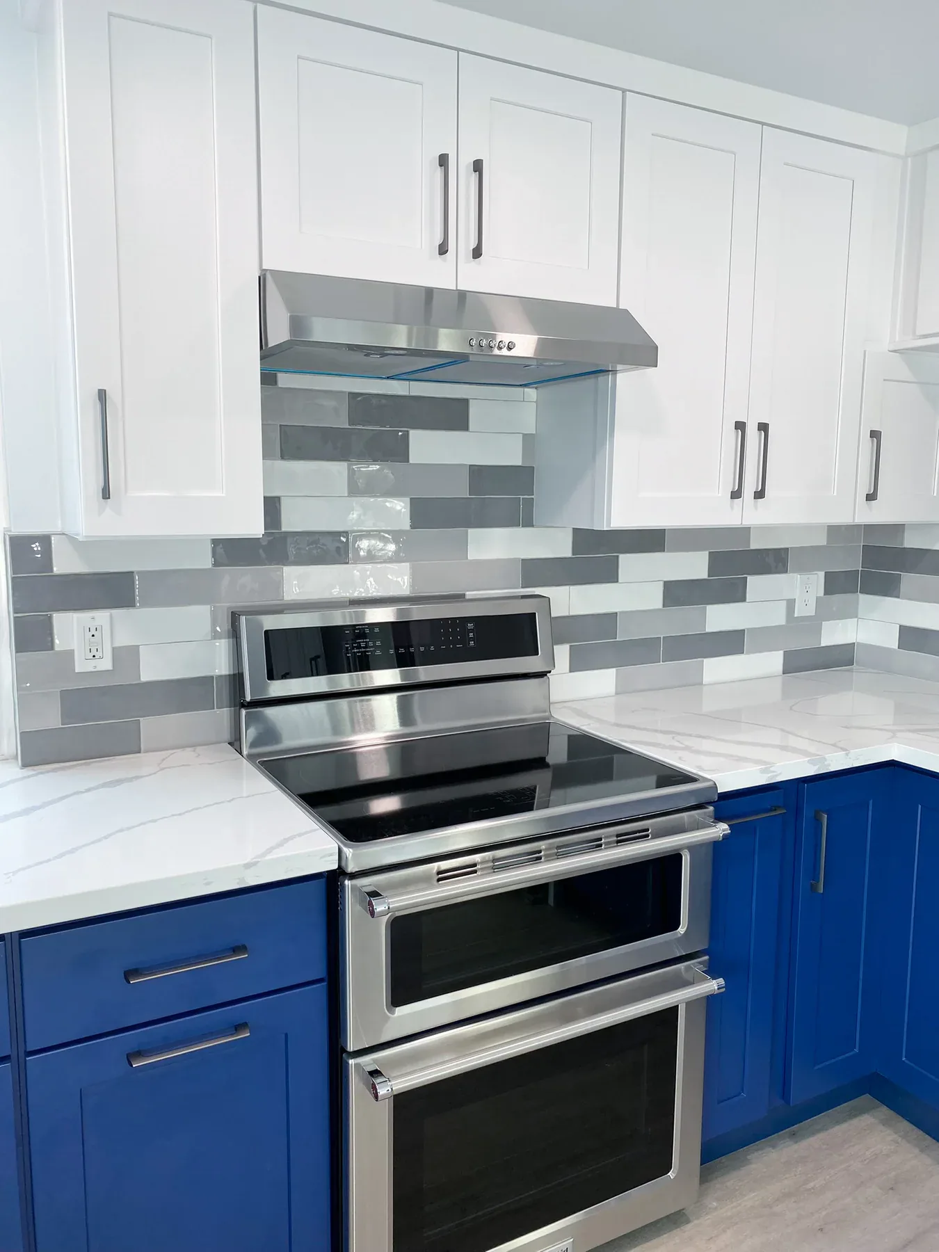 Stainless range and classic tiled backsplash