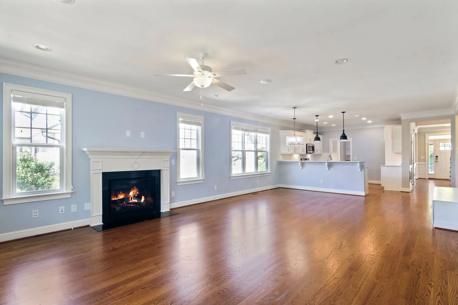 Whole home remodel after with open living room by Luxe Remodeling LLC