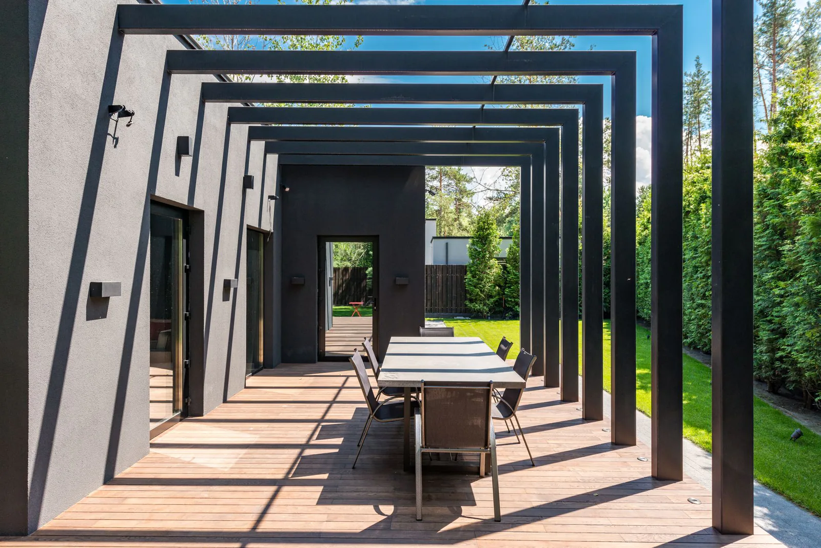 Custom outdoor living space with pergola
